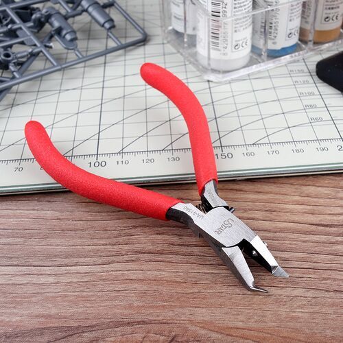 Ultra thin single edge curved nose cutting pliers