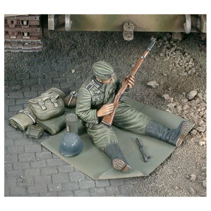 1:35 German soldier cleans up his rifle - WWII