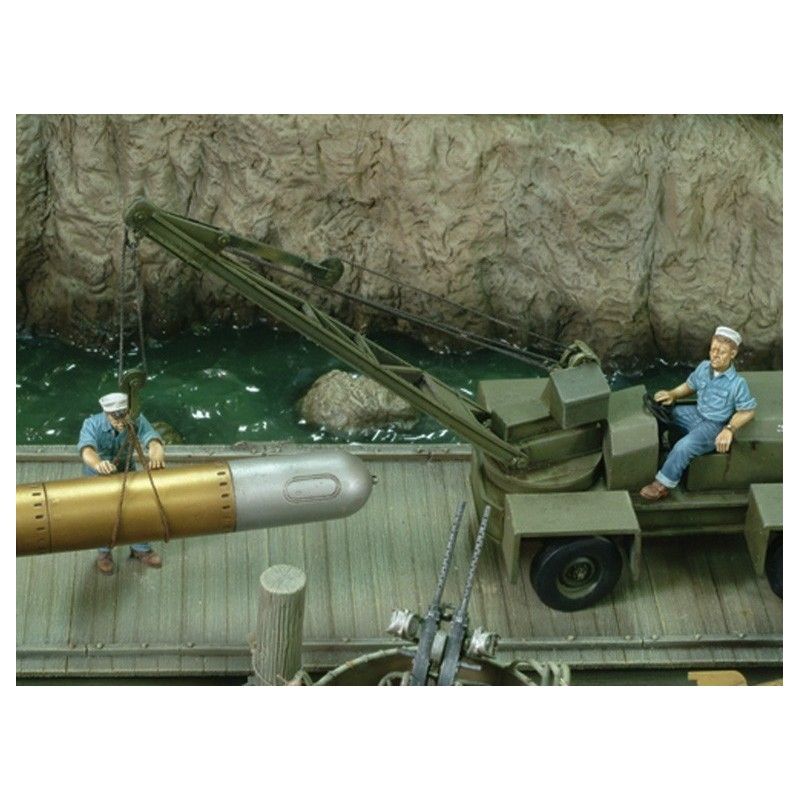 1:35 U.S. sailors loading torpedo - WWII