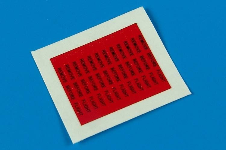 1:48 Remove before flight flags - black lettering